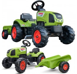 Žalias pedalais minamas Claas traktorius su priekaba