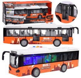 Oranžinis, didelis autobusas su šviesomis ir garsais