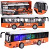 Oranžinis, didelis autobusas su šviesomis ir garsais